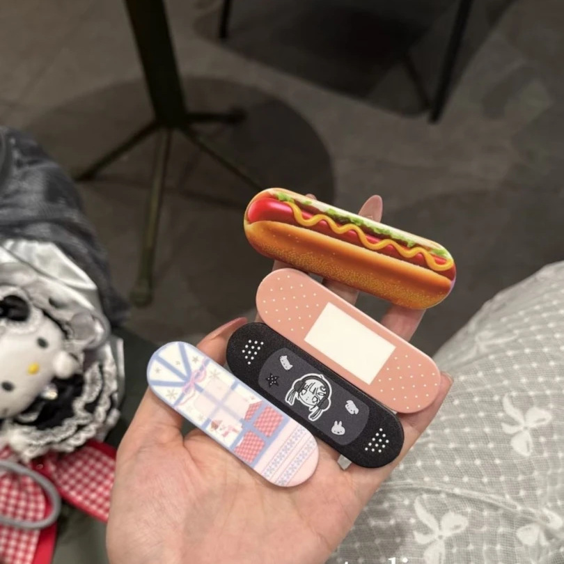 可愛い包帯型ホットドッグプッシュプル式スマホグリップホルダー - Bandage のレビューと価格